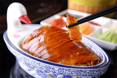 北京烤鸭加盟费用解析 餐饮加盟的投资与回报